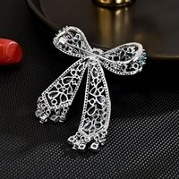 XILIANGFEIZI Broche Nœud Papillon Creuse de Luxe en Cuivre et Zircon, Accessoire de Mode pour Costume et Corsage Femme