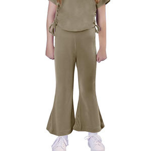 Pantalones acampanados ecológicos para niñas hechos de algodón orgánico y tintes de bajo impacto para un uso diario sostenible. - Product Image 1