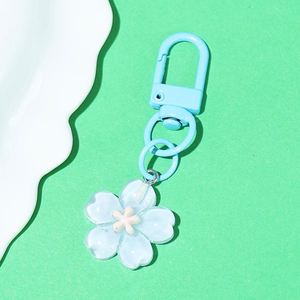 Breloques de sac imperméables pour femmes et filles, porte-clés en résine en forme de fleur de cerisier, breloques de clés en plastique - Product Image 3