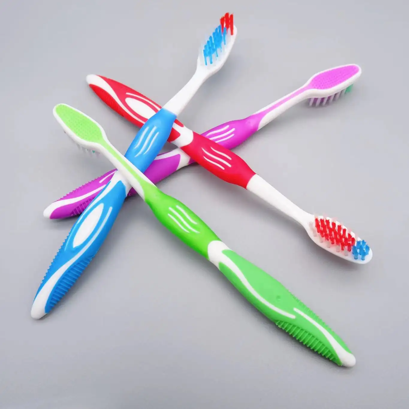 Wholesale dental brush toothbrush teeth whitening kit colorful bristle bright handle adult toothbrush