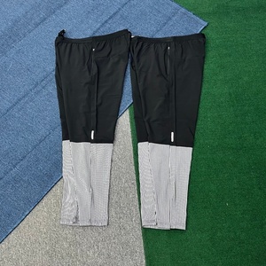 Pantaloni da corsa bicolore da <span class=keywords><strong>uomo</strong></span> di alta qualità con design <span class=keywords><strong>a</strong></span> <span class=keywords><strong>righe</strong></span> sul polpaccio per palestra e allenamento all'aperto. - Product Image 4