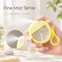Flacon pulvérisateur de parfum vide en silicone rond de 25 ml avec porte-clés, logo personnalisé, vente en gros, rechargeable, format carte