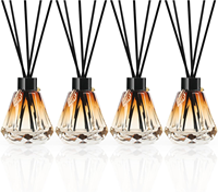 Bouteilles en verre délicates de diffuseur de roseau de décor de feuille d'or avec 20pcs bâtons de diffuseur de roseau et couvercles pour la salle de bain à la maison