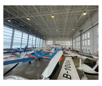 Hangar moderne Bâtiments Avions personnels Terminal Hélicoptère Avion Aéroport Entrepôt Avion Drone Hangar Atelier de maintenance