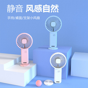 Handheld <b>Mini</b> USB Rechargeable Fan With Stand For <b>Desk</b> Or Portable Use F8 Pink White Light Blue DC Motor - Product Image 1