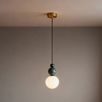 Lustre moderne finition marbre couleur cuivre avec éclairage LED pour salons et chambres à coucher