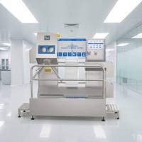 Machine automatique de lavage de semelles de chaussures avec système de brosses rotatives pour la gestion de l'hygiène des salles blanches en usine