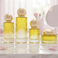 Botol Krim Kosong Bulat Vertikal 30g 50g Tebal 40ml 100ml 120ml Kuning Kaca untuk Esens Lotion Serum dengan Tutup Bola Emas Bulat