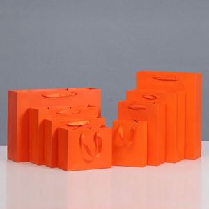 ถุงกระดาษช้อปปิ้งของขวัญ KM Promotional OEM ผลิตในจีน ขายส่ง พิมพ์โลโก้ตามสั่ง พร้อมริบบิ้นตกแต่ง รีไซเคิลได้ ใช้ในซูเปอร์มาร์เก็ต - Product Image 2