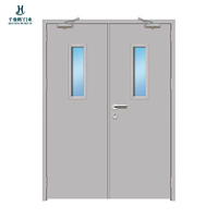 Porte sur mesure à double battant en acier inoxydable avec panneau vitré, style Mid-Century Modern, colonne romaine, coupe-feu, insonorisation, résistance à l'eau