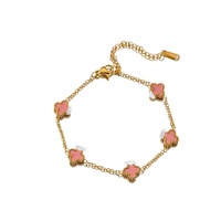 Bracelet de haute qualité, classique, en acier inoxydable plaqué or, double face, à quatre pétales de fleurs, adapté aux hommes et aux femmes