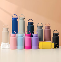 Bouteille d'eau isotherme portable légère en acier inoxydable avec poignée, grande capacité, finition caoutchouc doux au toucher, style mug spatial