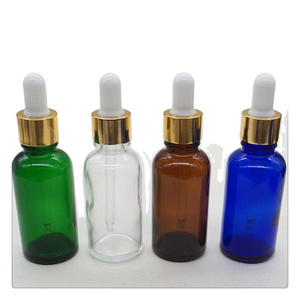 Flacon compte-gouttes ovale en verre transparent avec anneau doré, surface transparente, adapté pour l'emballage cosmétique d'huiles essentielles de 15 ml, compte-gouttes en caoutchouc. - Product Image 4