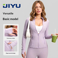 Veste de sport respirante couleur pêche pour femme, col montant, coupe ajustée, en spandex et polyester, avec poches zippées pour la course et la gym