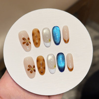 Faux ongles à presser peints à la main de qualité supérieure, motif floral écaille de tortue marron avec effet œil de chat bleu scintillant, vente en gros