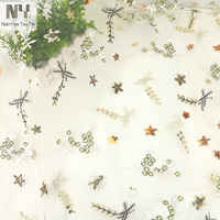 Tissu en tulle brodé de fleurs, d'étoiles et de feuilles, extensible, léger, doux et respirant, de la marque Nanyee, pour robes de mariée