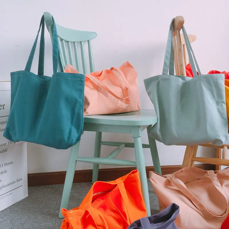 حقائب حمل قطنية للتسوق ملونة فارغة قابلة لإعادة الاستخدام مع شعار مطبوع مخصص