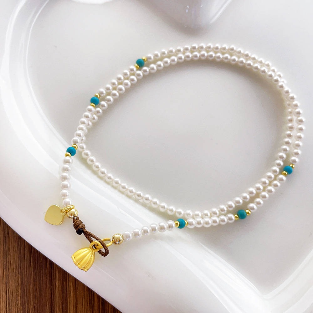 White shi jia lianpeng necklace