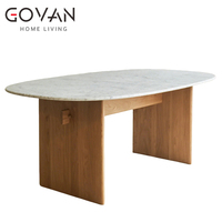 Table à manger ovale de style nordique avec pieds en bois de frêne et plateau en marbre pour usage domestique et commercial, capacité 6 personnes