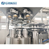Machine automatique de remplissage et de scellage de canettes de jus Équipement de mise en conserve isobare pour boisson bière