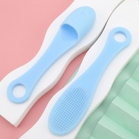Nouvelle brosse nettoyante faciale en silicone couleur macaron 2026, forme patte de chat, lavable, avec trou de suspension pour pores du nez