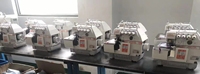 Machine à coudre industrielle Jack 747f d'occasion, surjeteuse quatre fils avec nouveau moteur Direct Drive