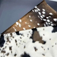 Tissu imprimé animalier effet poils de cheval, fausse fourrure de poney avec motif cerf Bambi pour vêtements