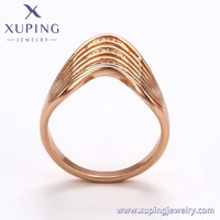 Ensemble de bijoux fantaisie XUPING en or rose avec cristaux ondulés, bague et boucles d'oreilles, style Art Déco, pour un usage quotidien
