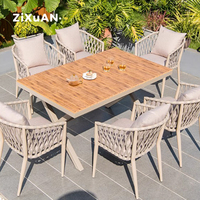 Table et chaises de restaurant de luxe pour patio d'hôtel, mobilier de jardin moderne en rotin, fauteuil nordique en aluminium imperméable pour piscine