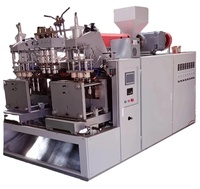 Machine de moulage Machine de soufflage semi-automatique de bouteilles en plastique Moulage par étirage-soufflage Machines de soufflage de plastique à 2 cavités