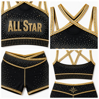 Ensemble d'entraînement de cheerleading OEM All Star avec soutien-gorge de sport à dos croisé noir et or orné de strass scintillants et short taille haute – Tenue d'équipe