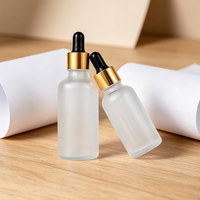 Flacon compte-gouttes en verre multi-tailles en gros, impression sérigraphique personnalisée, couvercle en métal électroplaqué et bambou pour sérum de soin et huile essentielle
