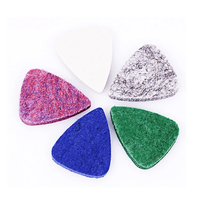 Plectres de guitare professionnels avec grip pour le pouce, design antidérapant pour prévenir la fatigue des mains