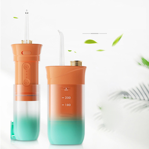 Vente en gros de nettoyeurs dentaires à jet d'eau USB à 4 buses, en plastique de haute qualité, pour usage domestique et hôtelier - Product Image 2