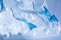 Projet d'éclairage FLUO-Design de lustre moderne dans le hall de l'hôtel