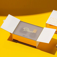 Boîte cadeau magnétique personnalisée en carton rigide avec feuille d'or recyclable et séparateurs magnétiques pour l'emballage des bougies