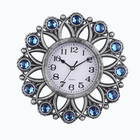 Jam Dinding Akrilik Plastik Motif Bunga Biru Sunburst Bulat untuk Ruang Makan Hotel Interior Elegan