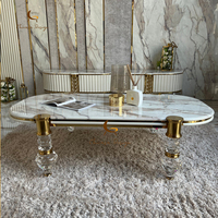 Table basse de luxe avec plateau en marbre, pieds en métal doré et cristaux, table de salon moderne pour hôtel, villa, salon