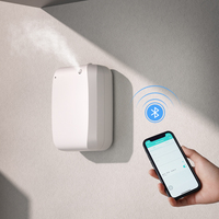 Diffuseur d'huiles essentielles électrique mural sans eau à double sortie de brume avec ventilateur pour OEM