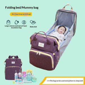 Sac à dos à langer 2-en-1 avec lit bébé pliable multifonctionnel et imperméable pour les voyages - Product Image 1