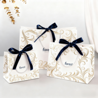 Nouveau sac cadeau Design floral rétro Ruban bicolore Poignée pour emballage de vacances et cadeaux de fête