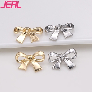 Hot Bán Kẽm Hợp Kim Đơn Giản Bow Kim Loại Nút Biểu Tượng Tùy Chỉnh Trang Trí Nút Cho Phụ Kiện May Mặc - Product Image 1