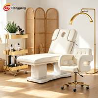 Table de massage électrique en cuir PU blanc à 4 moteurs inclinables pour clinique de beauté