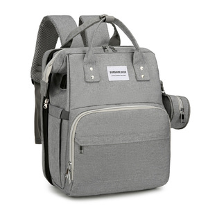 Sac à dos multifonctionnel pour couches avec port de charge USB intégré et lit bébé pliable - Product Image 3