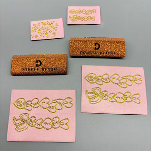 Las lujosas etiquetas tejidas para ropa con el logotipo personalizado dorado brillante, incluyendo etiquetas para camisas y etiquetas para jeans. - Product Image 3