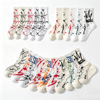 Chaussettes en coton jacquard OEM à imprimé graffiti abstrait et encre éclaboussée, style streetwear, unisexe, mode hip-hop, décontractées, cadeau