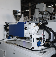 Machine de moulage par injection hydraulique verticale personnalisée TAYU TK-900 pour la production de balles de golf avec des matériaux PVC/PE/PP/ABS/PC
