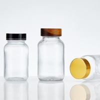 Capsule scellée étanche à la lumière médecine pilule bouteille en verre en gros clair/givré 150ml 200ml soins de santé Capsule partie bouteille en verre