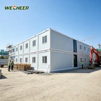 Maisons préfabriquées en acier de style moderne, conteneurs modulaires à panneaux sandwich pour maison temporaire sur site de plage