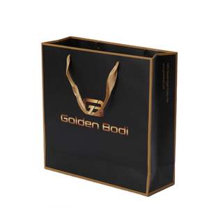 KM Wholesale Sacs en papier kraft noir de luxe modernes pour vêtements, parfums, bijoux, logo personnalisé, emballage cadeau unique pour le shopping - Product Image 1